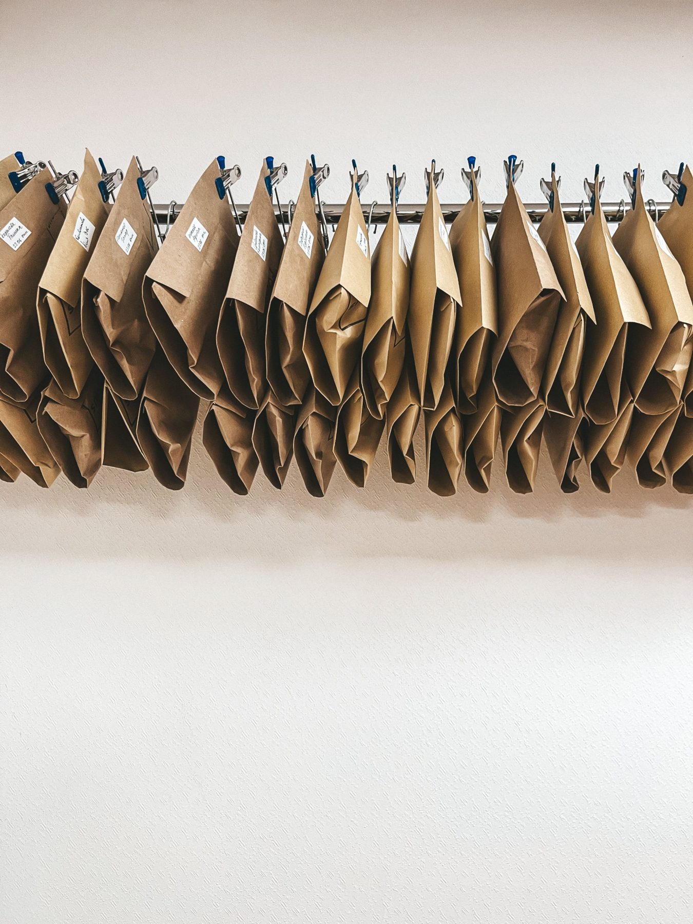 Rows of labelled kraft paper parcels